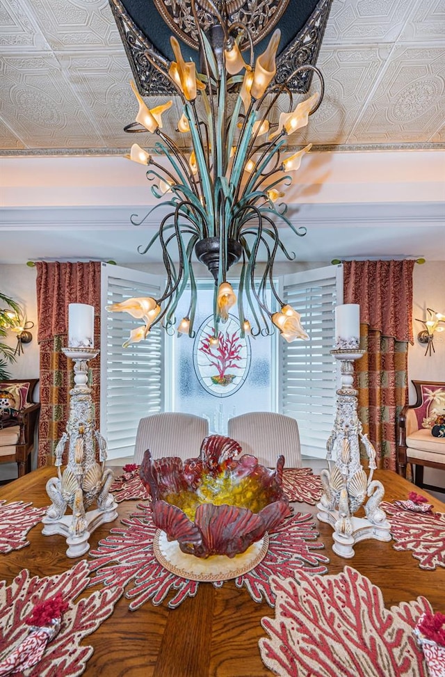 dining area with an ornate ceiling and a chandelier