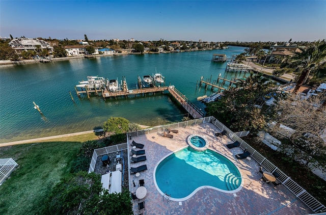 aerial view of a large body of water and a pool area
