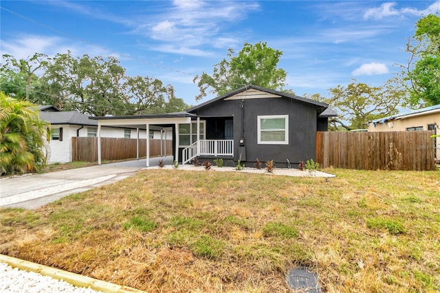 1914 E Emma St, Tampa, FL 33610 - single story home featuring driveway and an attached carport