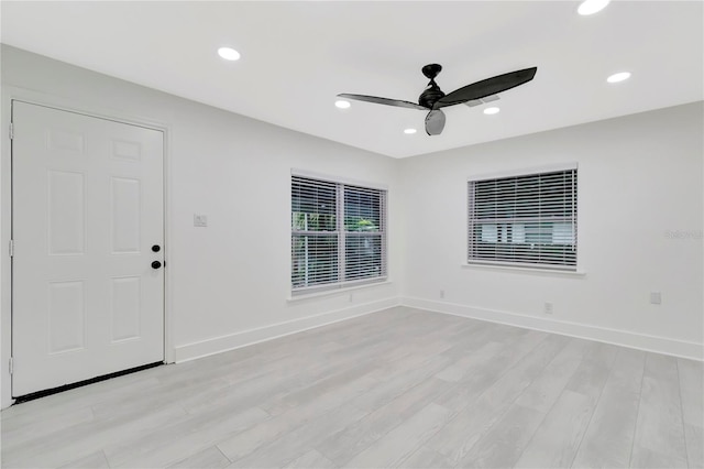 1914 E Emma St, Tampa, FL 33610 - empty room with ceiling fan, light wood-type flooring, recessed lighting, and baseboards
