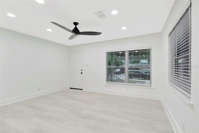 1914 E Emma St, Tampa, FL 33610 - unfurnished room featuring a ceiling fan, recessed lighting, baseboards, and light wood-style flooring