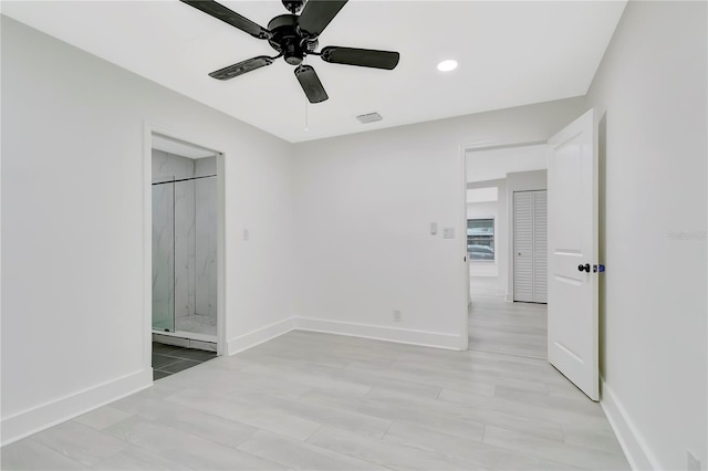 1914 E Emma St, Tampa, FL 33610 - unfurnished bedroom featuring baseboards, recessed lighting, a ceiling fan, and ensuite bathroom