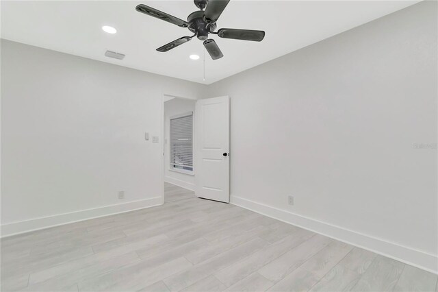 1914 E Emma St, Tampa, FL 33610 - empty room with ceiling fan, baseboards, recessed lighting, and light wood-style flooring