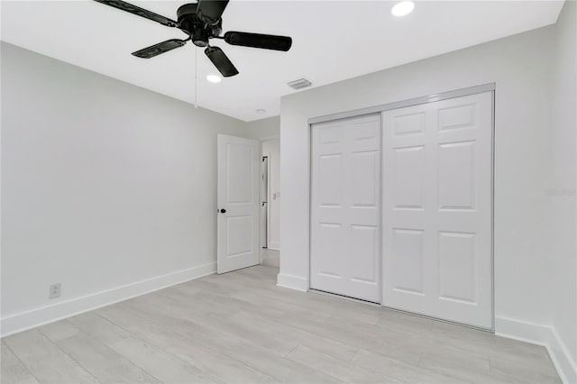 1914 E Emma St, Tampa, FL 33610 - unfurnished bedroom featuring baseboards, a closet, recessed lighting, light wood finished floors, and ceiling fan