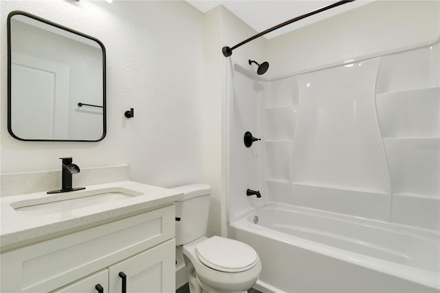 1914 E Emma St, Tampa, FL 33610 - bathroom with toilet, vanity,  shower combination, and a textured wall