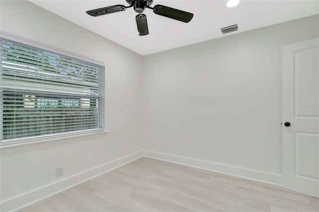 1914 E Emma St, Tampa, FL 33610 - unfurnished room with a ceiling fan, baseboards, and light wood-type flooring