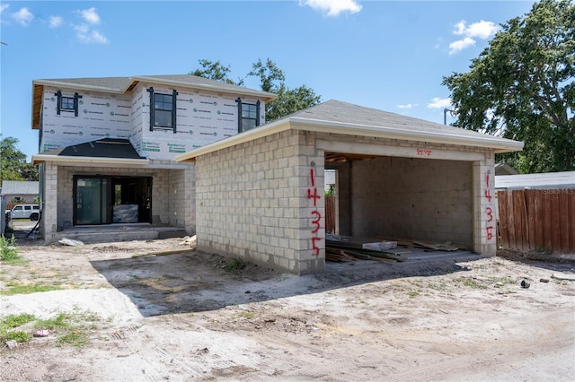 1435 17th Ave N, Saint Petersburg, FL 33704 - property in mid-construction featuring a garage and concrete block siding