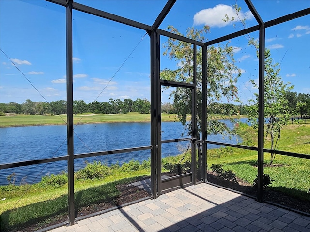 3776 Maxwell Park Dr, Sun City Center, FL 33573 - unfurnished sunroom featuring a water view and view of scattered trees