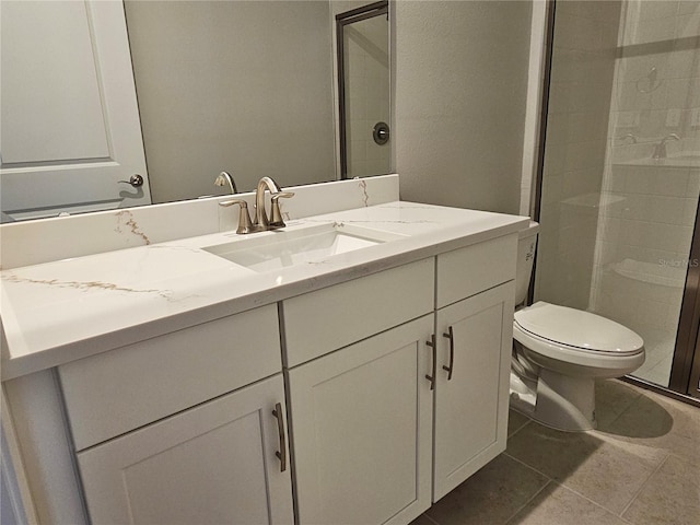 3776 Maxwell Park Dr, Sun City Center, FL 33573 - bathroom with vanity, toilet, a stall shower, and tile patterned floors