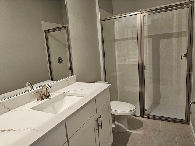 3776 Maxwell Park Dr, Sun City Center, FL 33573 - bathroom with vanity, toilet, a stall shower, and tile patterned floors