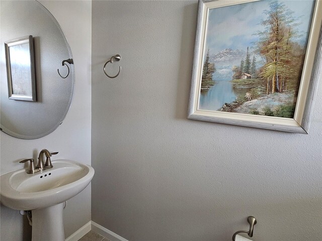 3776 Maxwell Park Dr, Sun City Center, FL 33573 - bathroom with baseboards