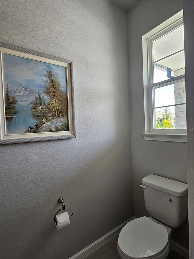 3776 Maxwell Park Dr, Sun City Center, FL 33573 - bathroom with toilet and baseboards