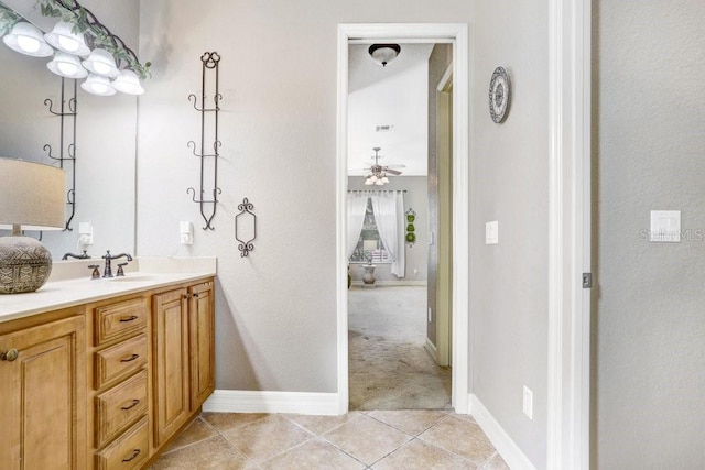 2502 Fritzke Rd, Dover, FL 33527 - bathroom featuring vanity, tile patterned flooring, a ceiling fan, and baseboards