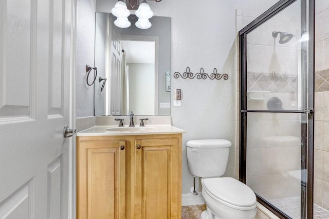 2502 Fritzke Rd, Dover, FL 33527 - bathroom featuring a stall shower, toilet, vanity, and a chandelier