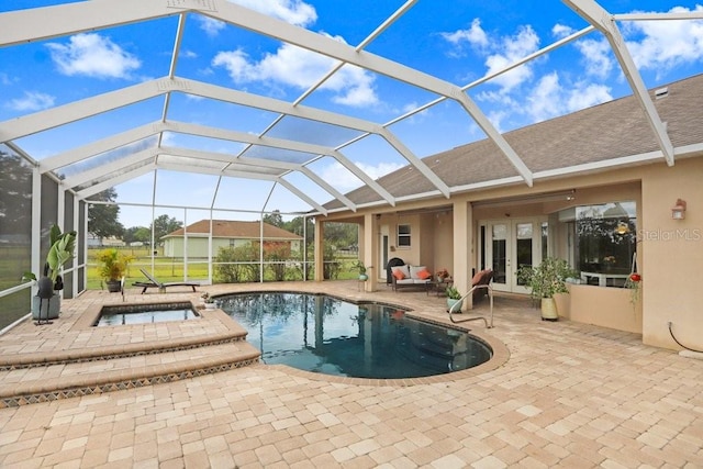 2502 Fritzke Rd, Dover, FL 33527 - view of pool featuring french doors, a patio, glass enclosure, and a pool with connected hot tub