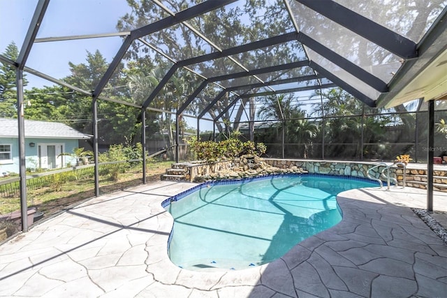 2287 Demaret Dr, Dunedin, FL 34698 - view of swimming pool with a patio and glass enclosure