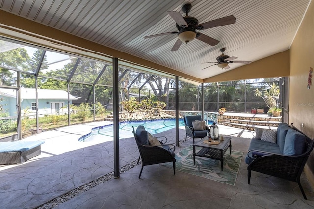 2287 Demaret Dr, Dunedin, FL 34698 - view of patio / terrace with an outdoor living space, glass enclosure, an outdoor pool, and a ceiling fan