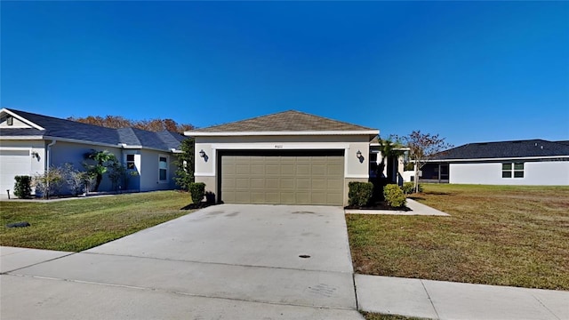 single story home with a garage, stucco siding, a front lawn, and driveway