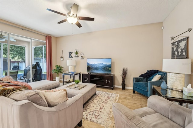 9917 Prevatt St, Gibsonton, FL 33534 - living room featuring ceiling fan and baseboards