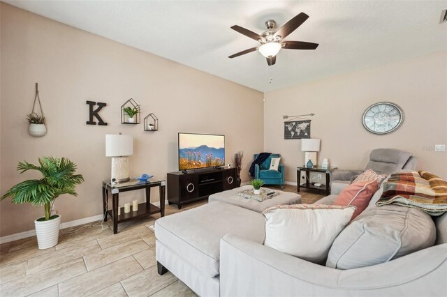 9917 Prevatt St, Gibsonton, FL 33534 - living room with ceiling fan and baseboards