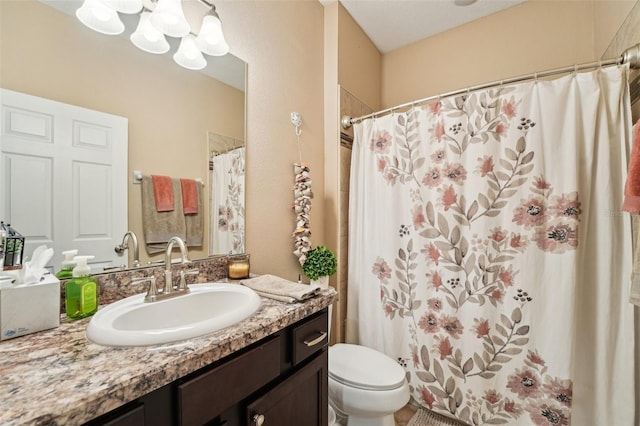 9917 Prevatt St, Gibsonton, FL 33534 - bathroom with a chandelier, toilet, vanity, and a shower with curtain