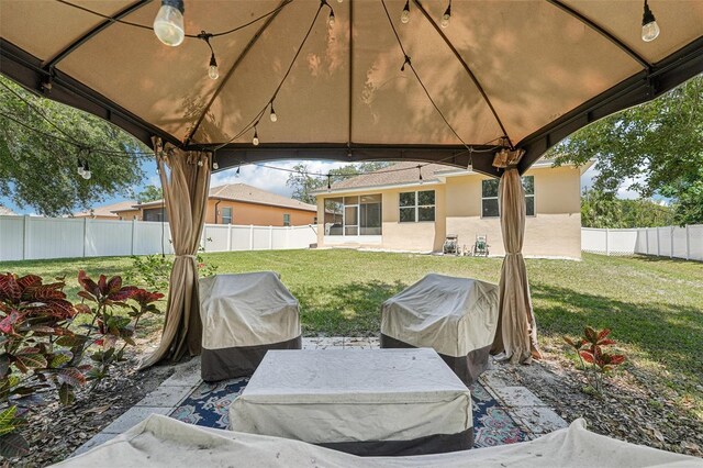 9917 Prevatt St, Gibsonton, FL 33534 - view of patio with a gazebo and area for grilling
