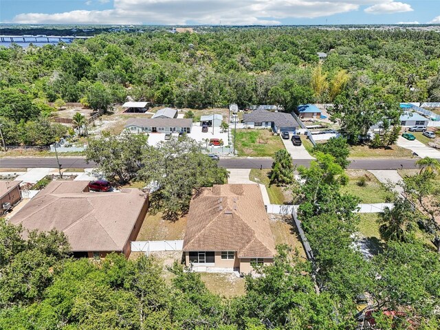 9917 Prevatt St, Gibsonton, FL 33534 - aerial view of residential area featuring a forest