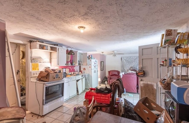 kitchen with open shelves, white appliances, light tile patterned flooring, a textured ceiling, and a ceiling fan