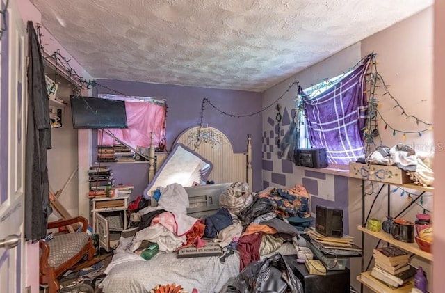 bedroom with a textured ceiling