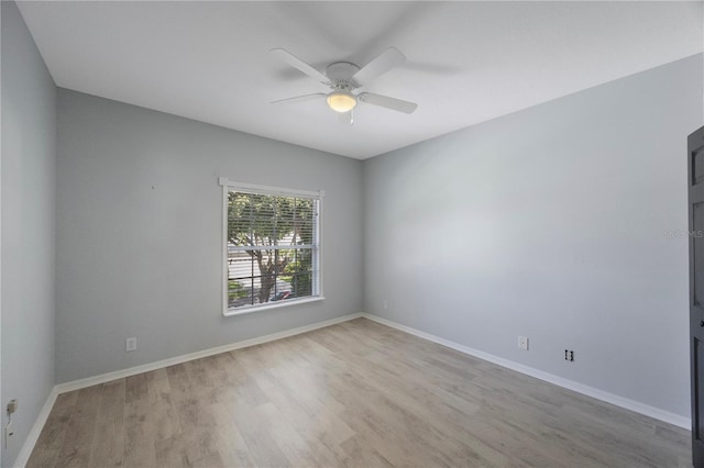 17809 Sandpine Trace Way, Tampa, FL 33647 - unfurnished room featuring a ceiling fan, wood finished floors, and baseboards