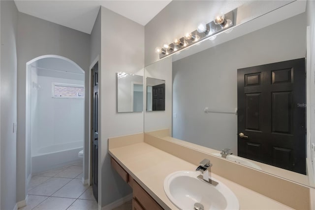 17809 Sandpine Trace Way, Tampa, FL 33647 - bathroom featuring vanity, toilet, tile patterned floors, tub / shower combination, and baseboards