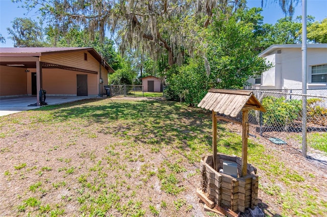 view of yard with an attached carport
