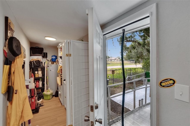 528 S Seminole Ave, Fort Meade, FL 33841 - entryway with light wood-type flooring and water heater