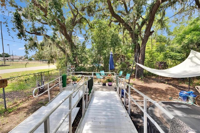 528 S Seminole Ave, Fort Meade, FL 33841 - dock area with view of wooded area