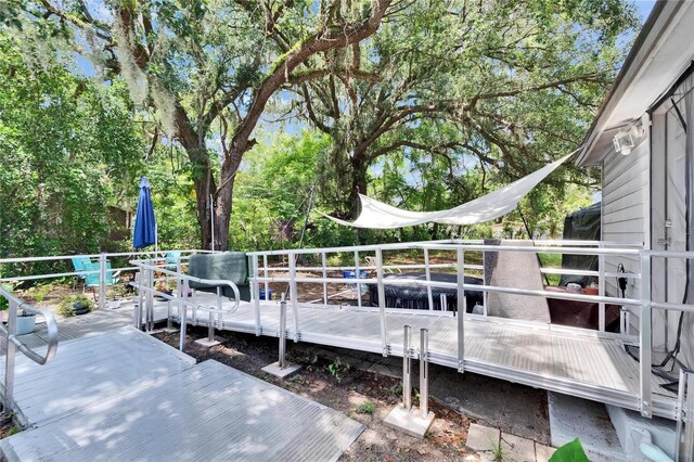 528 S Seminole Ave, Fort Meade, FL 33841 - deck featuring view of scattered trees