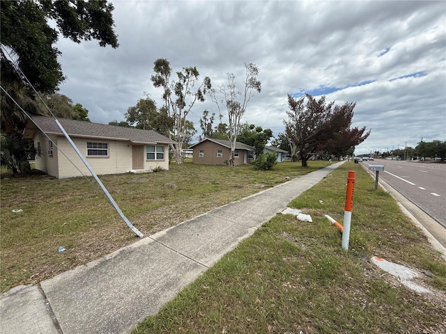 6797 54th Ave N, Saint Petersburg, FL 33709 - view of asphalt road featuring sidewalks