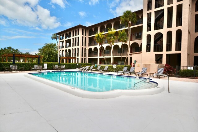 6150 Gulfport Blvd S Unit 302, Gulfport, FL 33707 - community pool with a patio area