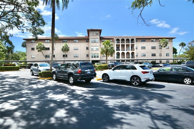 6150 Gulfport Blvd S Unit 302, Gulfport, FL 33707 - view of building exterior featuring uncovered parking