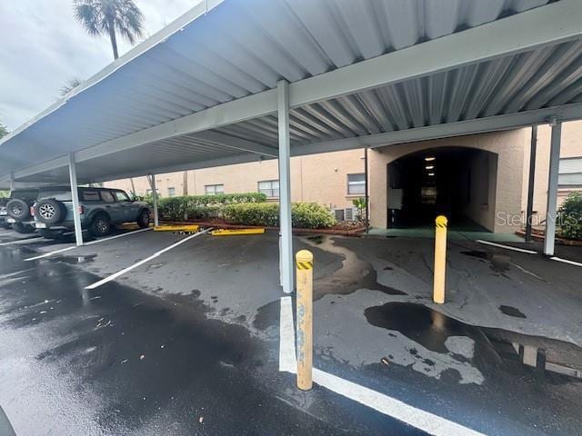 6150 Gulfport Blvd S Unit 302, Gulfport, FL 33707 - view of covered parking lot