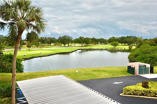 6150 Gulfport Blvd S Unit 302, Gulfport, FL 33707 - view of home's community with a water view, a lawn, and view of golf course