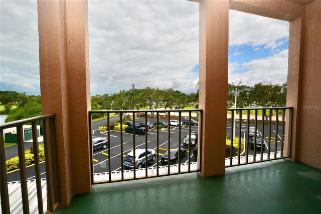 6150 Gulfport Blvd S Unit 302, Gulfport, FL 33707 - balcony featuring view of scattered trees