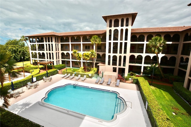 6150 Gulfport Blvd S Unit 302, Gulfport, FL 33707 - community pool featuring a patio area