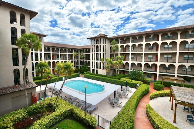 6150 Gulfport Blvd S Unit 302, Gulfport, FL 33707 - community pool with a patio area