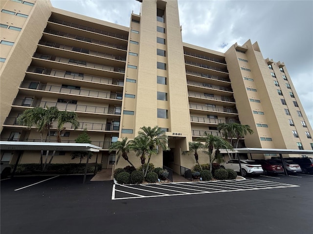 2621 Cove Cay Dr Unit 206, Clearwater, FL 33760 - view of building exterior with covered parking