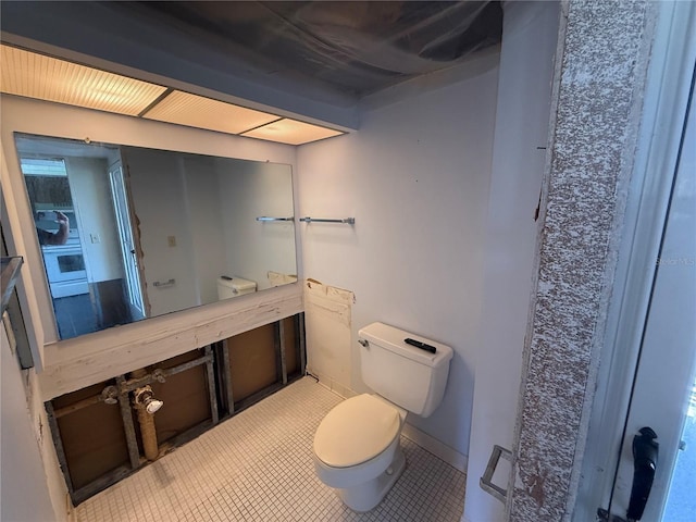 2621 Cove Cay Dr Unit 206, Clearwater, FL 33760 - bathroom with toilet and tile patterned flooring