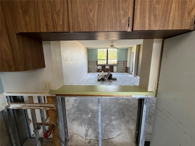 2621 Cove Cay Dr Unit 206, Clearwater, FL 33760 - kitchen with ceiling fan and modern cabinets