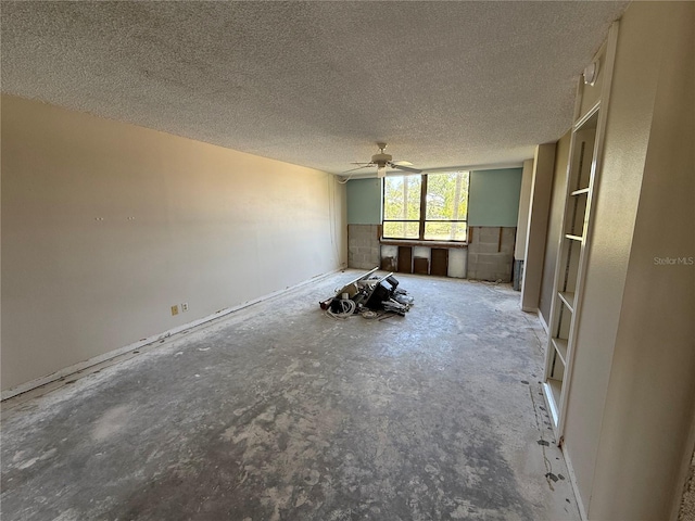 2621 Cove Cay Dr Unit 206, Clearwater, FL 33760 - empty room with a ceiling fan and a textured ceiling
