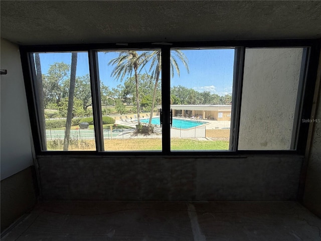 2621 Cove Cay Dr Unit 206, Clearwater, FL 33760 - interior space with healthy amount of natural light and a textured ceiling