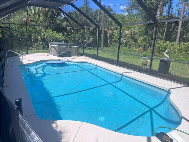 2841 S Cranberry Blvd, North Port, FL 34286 - outdoor pool featuring a hot tub, a patio, and glass enclosure