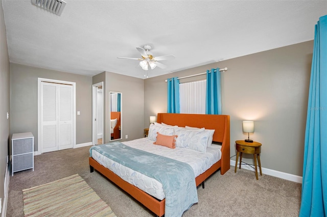3749 Mckay Creek Dr, Largo, FL 33770 - carpeted bedroom featuring a closet, baseboards, and ceiling fan